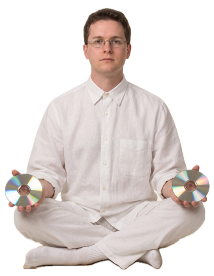 The GuruHits guru, holding two CDs
